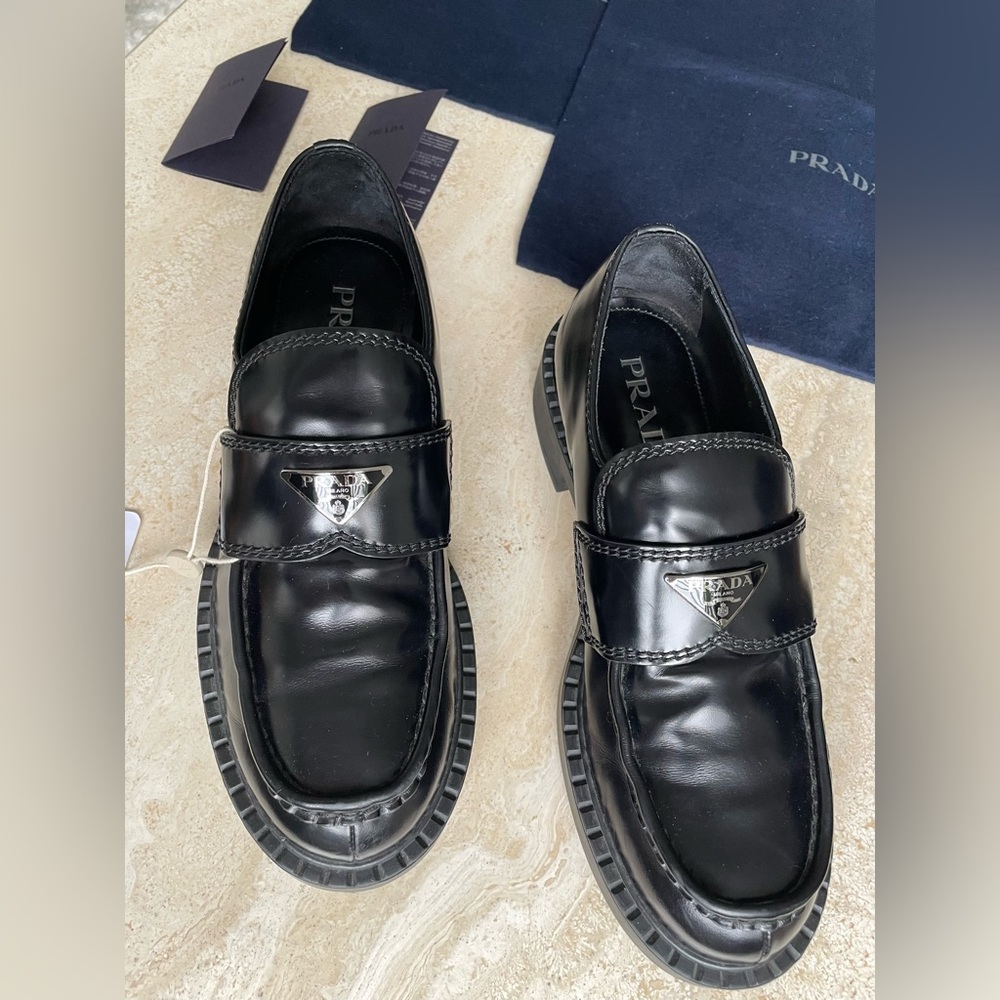 PRADA brushed black leather slip on loafers